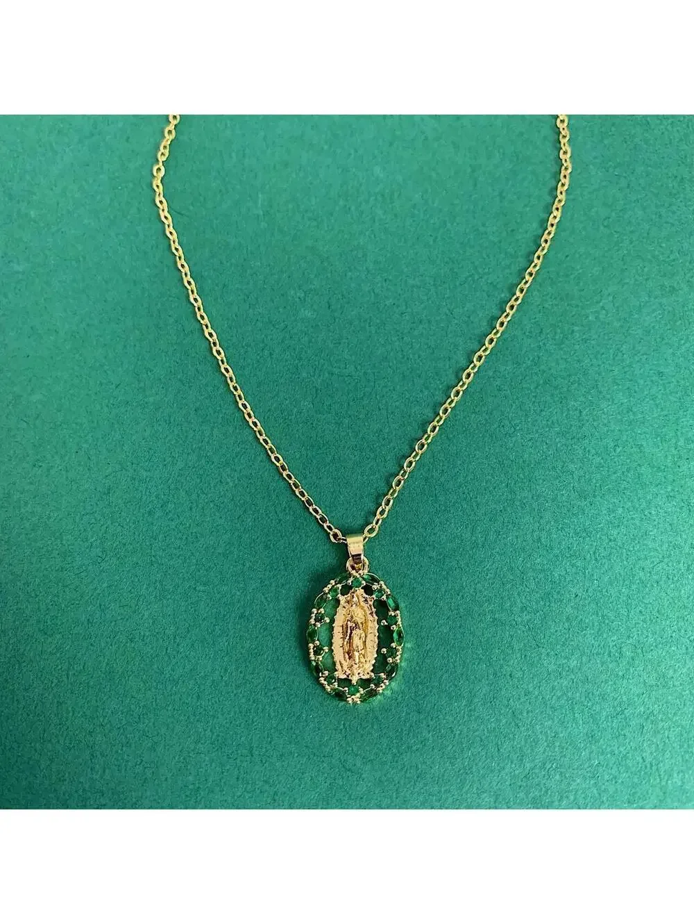 Y2k style gold Saint Marry green rhinestone pendant necklace. 19 inches length.